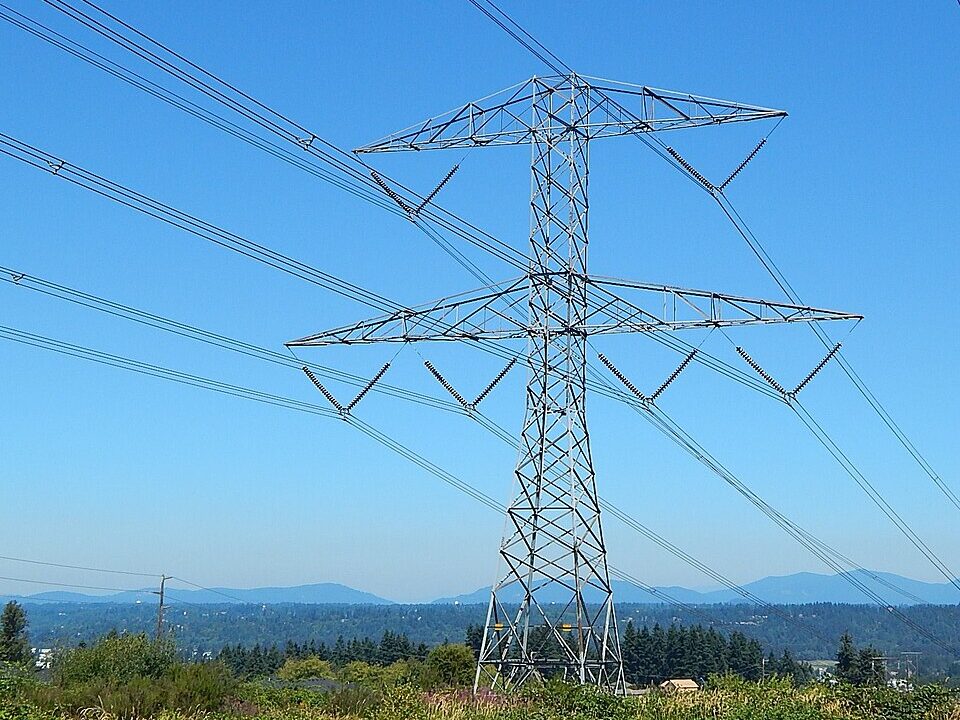 High-voltage electricity transmission tower and power lines